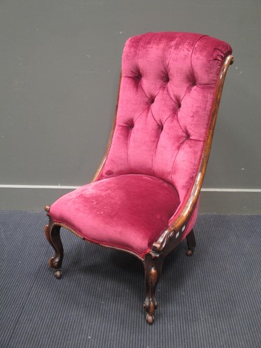 Lot 775 - A Victorian mahogany nursing chair, with pink...