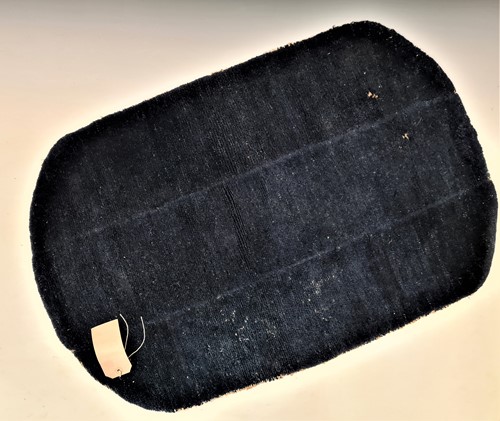 Lot 166 - An Antique Tibetan monochrome tufted 'Tsutruk',...