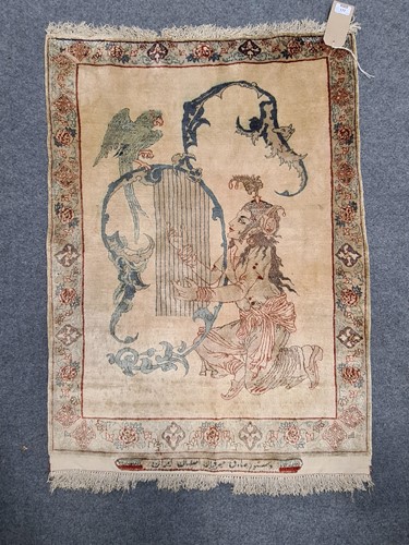 Lot 177 - A figural silk rug, possibly Tibetan 79 x 58cm;...