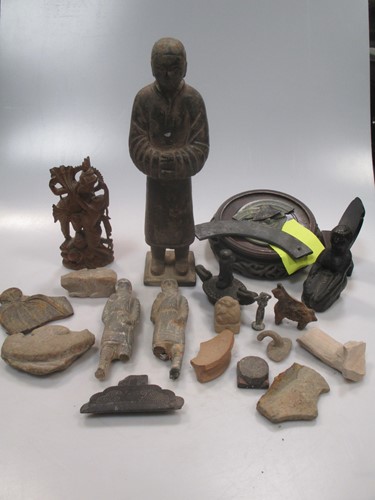 Lot 185 - A Chinese metal figure of a standing guard, in...