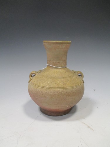 Lot 190 - A Chinese olive glazed pottery Hu jar, Han...