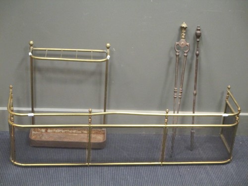 Lot 717 - A George III brass fire fender, 122cm wide, a...
