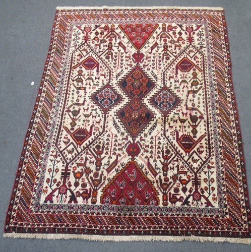 Lot 898 - An Afghan type rug, the field with geometric...