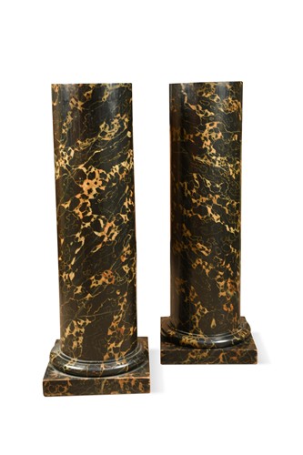 Lot 282 - A pair of painted simulated marble classical columns, 20th century