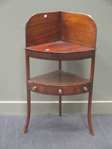 Lot 453 - A Regency mahogany corner wash stand 107cm...