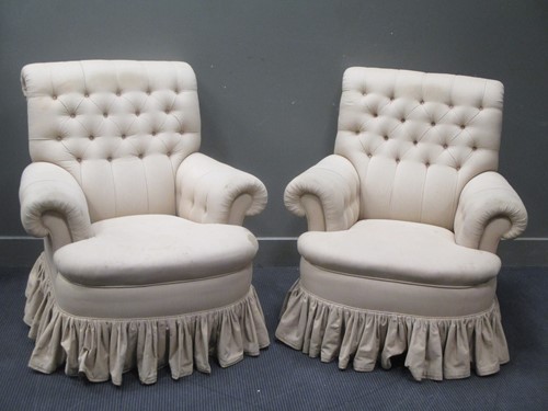 Lot 631 - A pair of Howard style deep modern easy armchairs