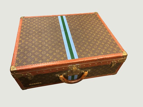 Lot 105 - A Louis Vuitton monogrammed leather rigid suitcase