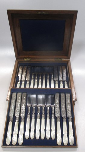 Lot 461 - A canteen of mother of pearl handled dessert...