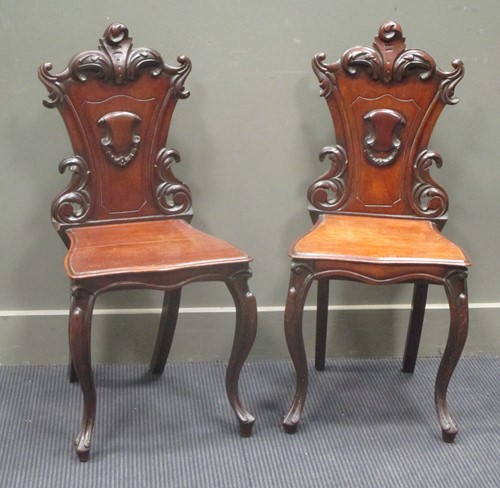 Lot 788 - A pair of Victorian mahogany hall chairs (2)