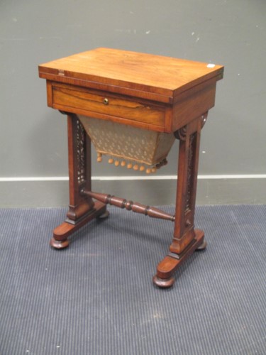 Lot 697 - A 19th century rosewood work table, the...