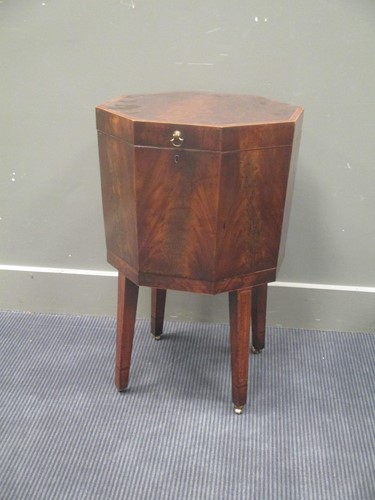 Lot 452 - A George III mahogany octagonal wine cooler,...