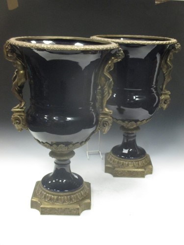 Lot 105 - A pair of gilt metal and cobalt blue coloured...