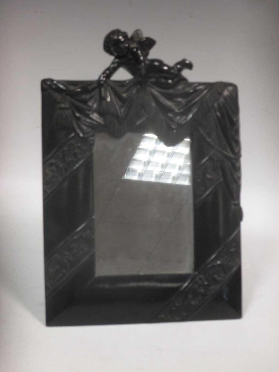Lot 10 - An early 20th century moulded composition...