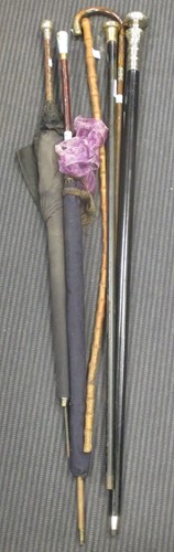 Lot 369 - Two silver mounted walking canes, a silver...