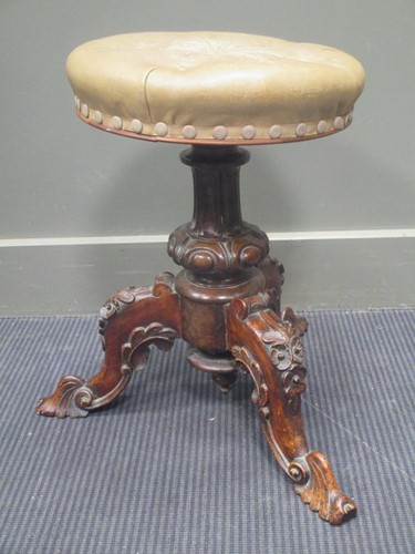 Lot 679 - A Victorian piano stool