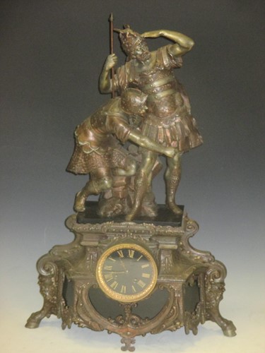 Lot 34 - A bronze mantel clock with figural mounts,...