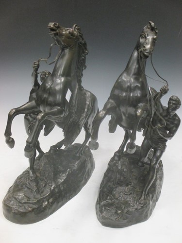 Lot 32 - A pair of hollow bronze Marly horses, 42cm