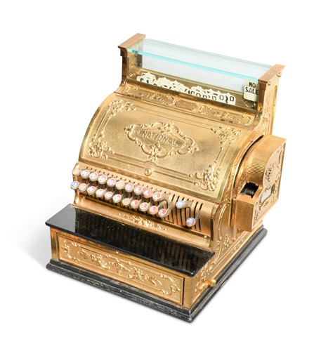 Lot 451 - A cast brass National cash register, early 19th century