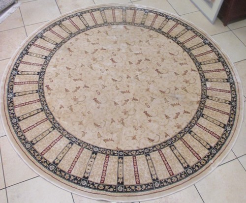 Lot 643 - A Persian design terracotta rug; together with...