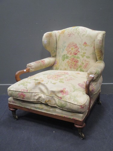 Lot 745 - A 20th century walnut low armchair, with...