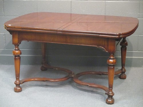 Lot 833 - A William and Mary style extending dining...