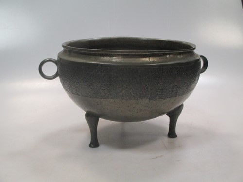 Lot 49 - A Chinese bronze Tripod bowl, Ding, in Eastern...