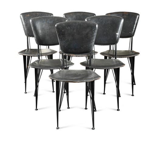 Lot 206 - A set of six black vinyl upholstered dining chairs, probably Italian