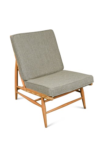 Lot 189 - Lucian Ecolani for Ercol, a model 427 beech framed lounge chair and stool