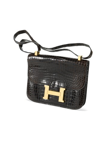 Lot 75 - An Hermès brown crocodile leather Constance bag