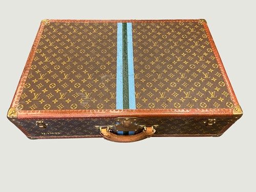 Lot 106 - A Louis Vuitton monogrammed leather rigid suitcase