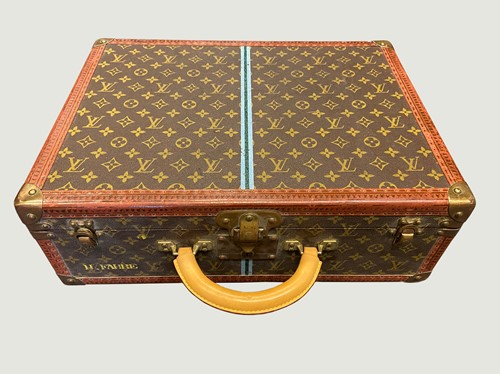 Lot 107 - A Louis Vuitton monogrammed leather rigid suitcase