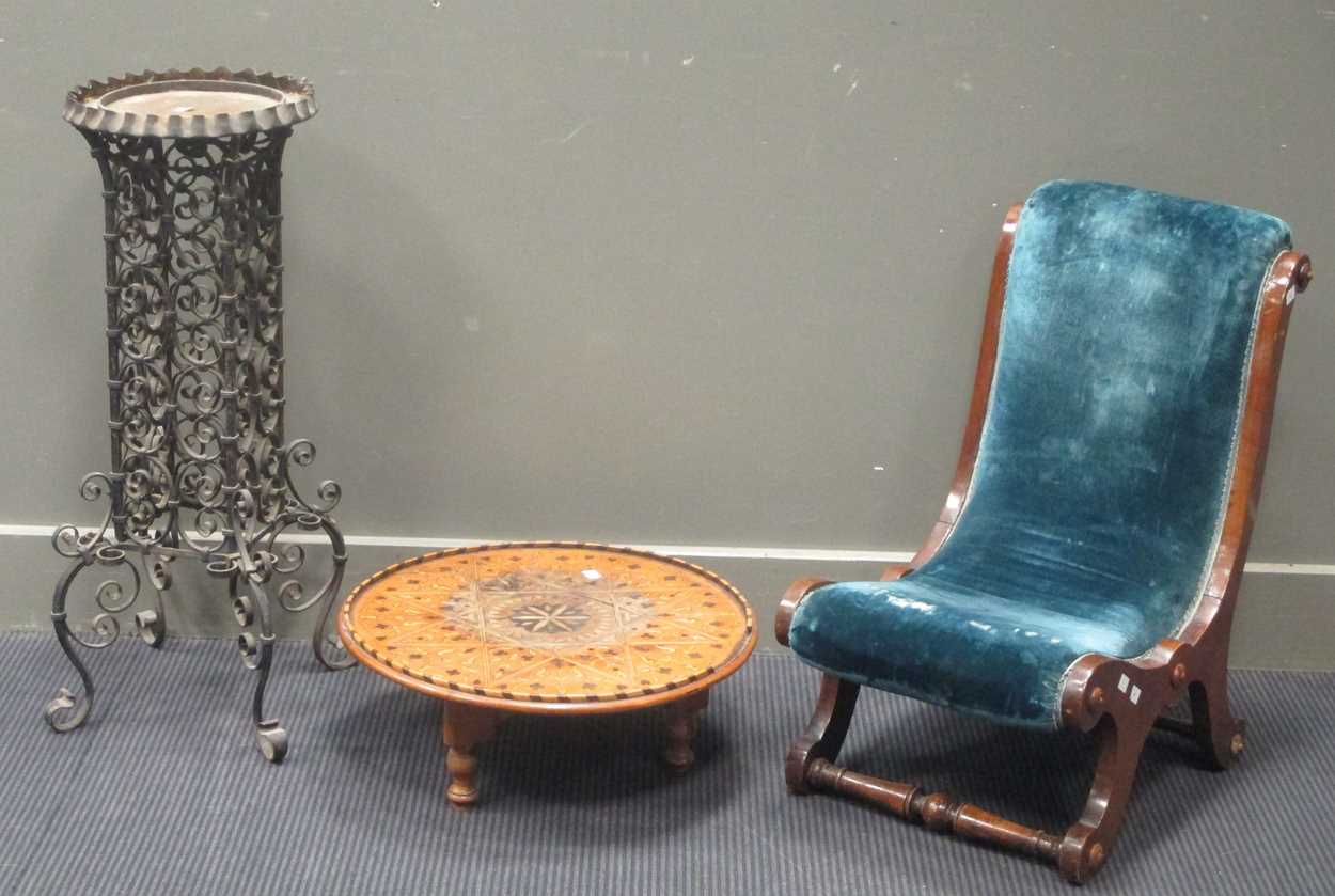 Lot 499 - A shaped wrought iron stand, an inlaid wood...
