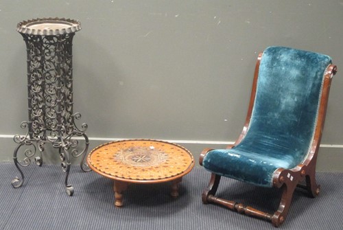 Lot 499 - A shaped wrought iron stand, an inlaid wood...