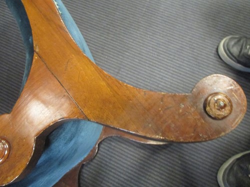 Lot 499 - A shaped wrought iron stand, an inlaid wood...