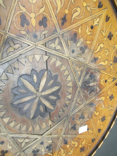 Lot 499 - A shaped wrought iron stand, an inlaid wood...