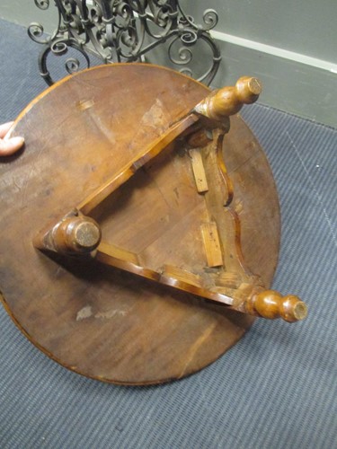 Lot 499 - A shaped wrought iron stand, an inlaid wood...