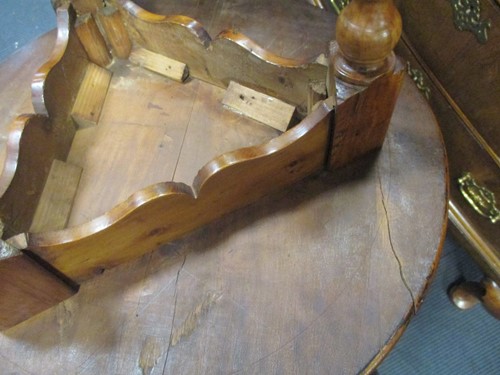 Lot 499 - A shaped wrought iron stand, an inlaid wood...