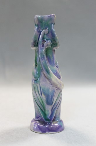 Lot 23 - Attributed to Brannam Pottery, a small grotesque Jug