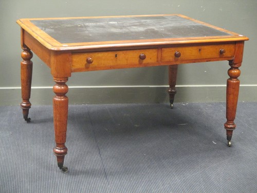 Lot 512 - A Victorian mahogany two drawer writing table...