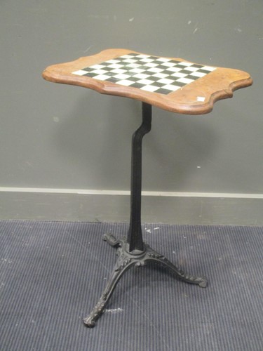 Lot 563 - A walnut occasional table, inlaid with tile...
