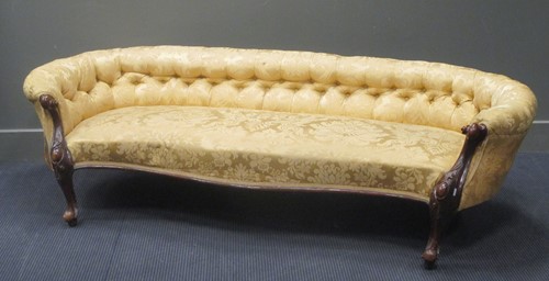 Lot 539 - A Victorian showframe sofa, with button back...