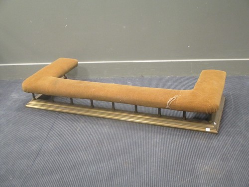 Lot 444 - A brass fender with recovered top, 139cm wide,...