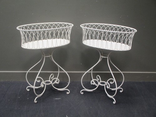 Lot 545 - Two white painted wirework plant stands, 86 x...