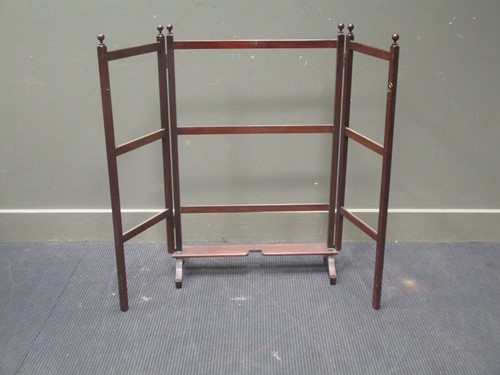 Lot 514 - A mahogany towel horse and glazed folding fire...