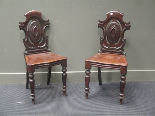 Lot 558 - A pair of Victorian mahogany cartouche back...