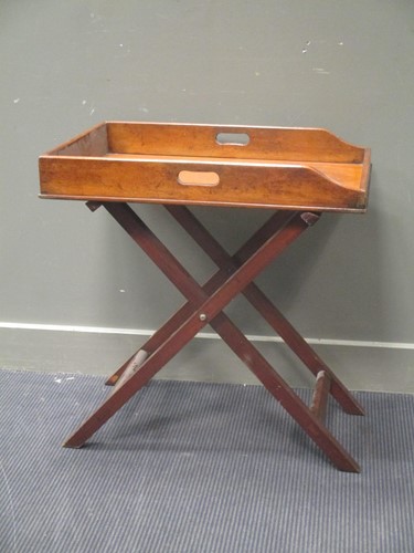 Lot 549 - A mahogany butler's tray on stand