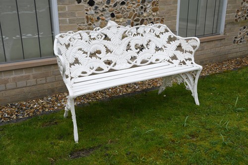 Lot 481 - A white painted aluminium garden bench
