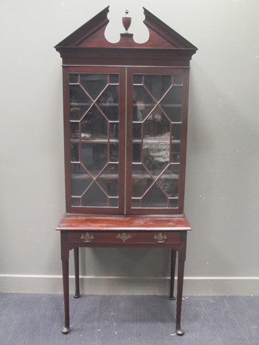 Lot 523 - A George III style mahogany glazed top cabinet...