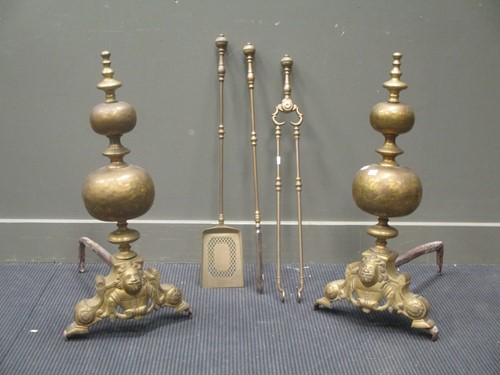 Lot 589 - A large pair of 19th Dutch brass andirons,...