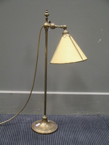 Lot 529 - An adjustable brass desk lamp, early 20th...